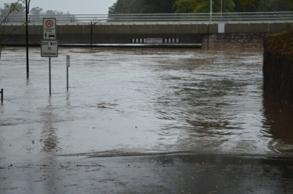 Rising floodwaters at Windsor Flood waters lapping at Windsor Bridge