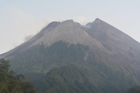 Active volcanoes, storms and volcanic eruptions Volcanic eruptions and thunderstorms - Gunung Merapi Indonesia July and August 2023.