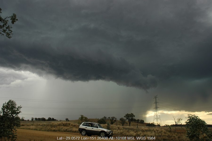 Severe storm with very close lightning hitting power pole near